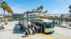 Commuters boarding transit bus